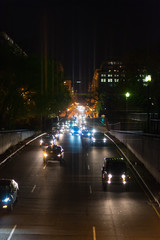 Oncoming Headlights in Washington D.C. with Colorful Vertical and Horizontal Lens Flare