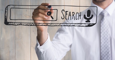 Business man mid section writing search bar against wood panel