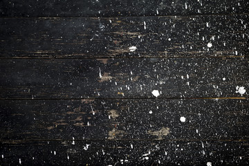Abstract background of white dot on black wooden