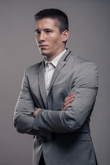 Fototapeta premium one young man, upper body, formal clothes, sideways, blank expression