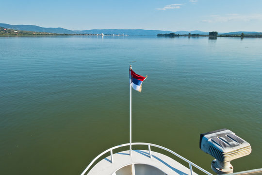 Cruiser ship sales on Danube river at sunny summer day in Serbia