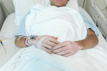 Fototapeta premium Closeup of saline drip-Patient admit in hospital with iv saline