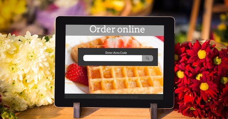 Digital tablet with waffle and text on screen 