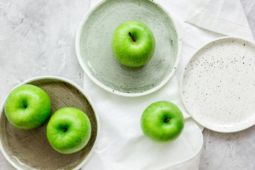 green apples for healthy dessert on white background top view