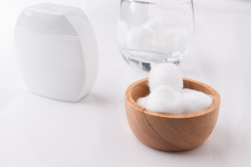 cotton wool in wooden bowl