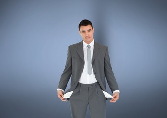 Businessman with empty pockets standing 