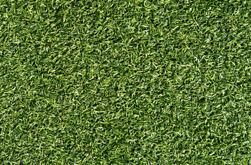 Fototapeta premium Green color decorative grass loan for sport and leisure.