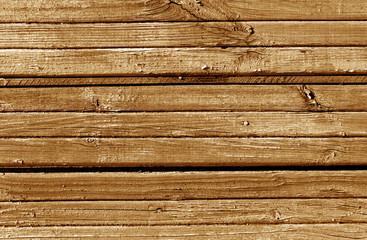 Orange weathered wooden wall texture.