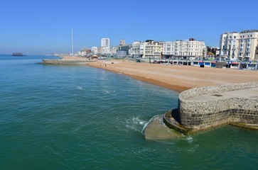 The coast of Brighton on a hot day in May.
