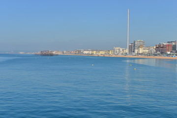 The coast of Brighton on a hot day in May.
