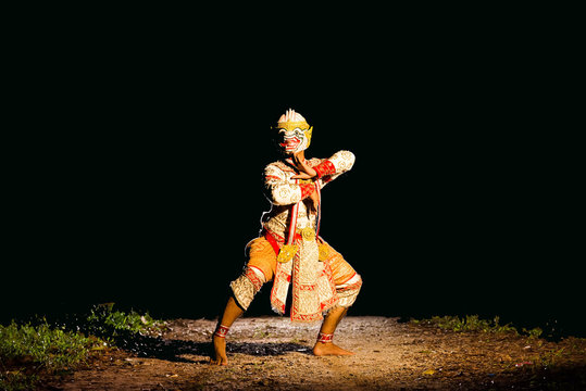 Portrait marked Male of Thai dancing art with black background. Low key portrait Siam.