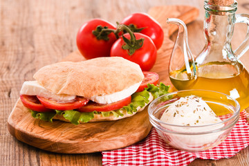 Puccia bread with mozzarella and tomato.