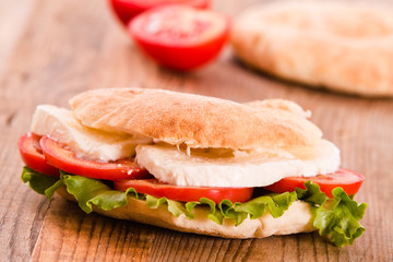 Puccia bread with mozzarella and tomato.