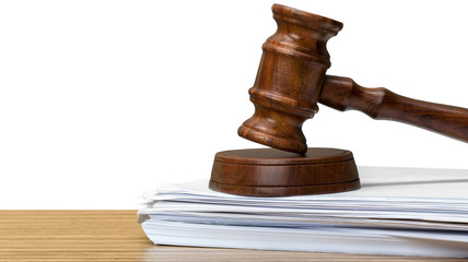 judge hammer on white paper and table
