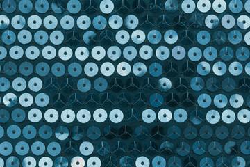 Blue fabric with stitched circles