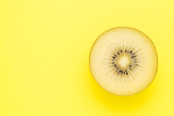 top view kiwi fruit on yellow background