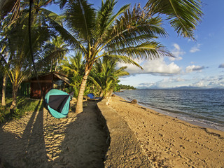 Tropical beach in the late afternoon sunlight