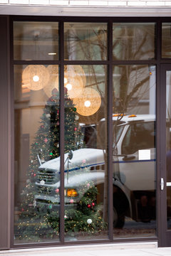 Business Semi Truck In Reflection Of Christmas Window