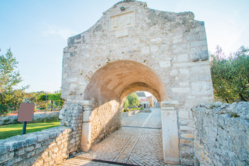 Old lowet town gate in medieval historic town of Nin, Dalmatia, Croatia
