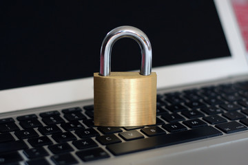 Locked padlock on notebook