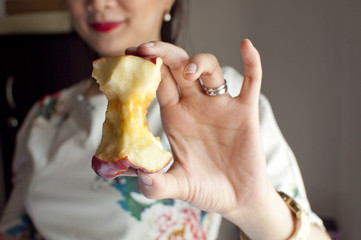 woman holding an apple