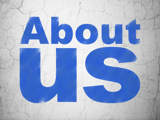 Obraz premium Advertising concept: About Us on wall background