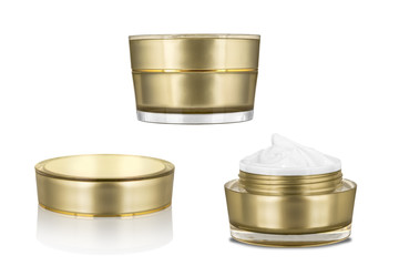 Luxury cosmetic face moisturizing white cream for aged skin in open and closed glossy golden can with matching lid, isolated on white background, clipping path included