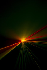 Laser beam tilt orange on a black background