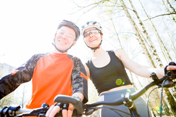 Girl and guy in helmets