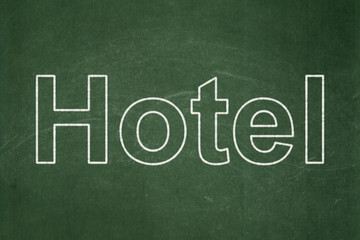 Obraz premium Travel concept: Hotel on chalkboard background