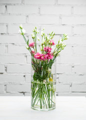 vase with fresh flowers close-up