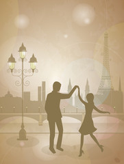 Boy and girl dancing on the streets of Paris. Silhouette of dancing men and women against the background of the eiffel tower. Romantic background with Eiffel tower for design. 


