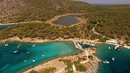 Fototapeta premium Aerial drone photo of Agistri island, Aponissos with turquoise waters, Saronic gulf, Greece