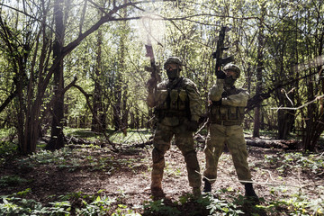 Fototapeta premium Photo of soldiers with arms