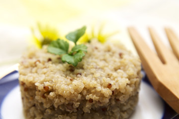 Cooked quinoa dish with cutlery
