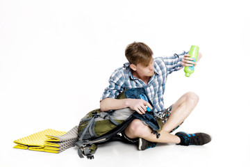 tourist is thirsty. traveler wants to drink water, but the water is over
