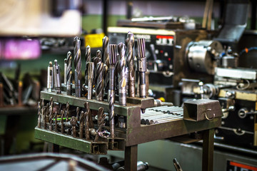 Group of drill bits in an industrial plant