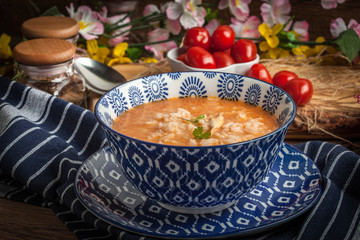 Fresh tomato soup with rice.