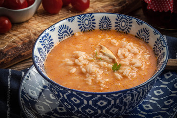 Fresh tomato soup with rice.