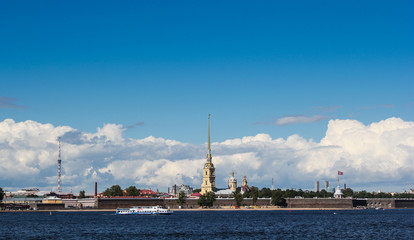 Fototapeta na wymiar Peter and Paul fortress on the background of river and sky