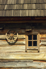 Vintage retro blockhouse wooden house wall with window