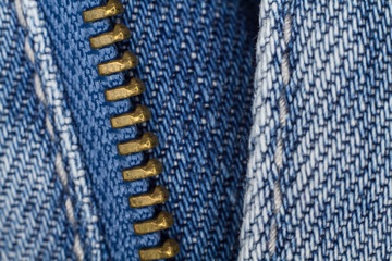 Blue jeans zipper closeup macro