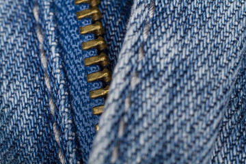 Blue jeans zipper closeup macro