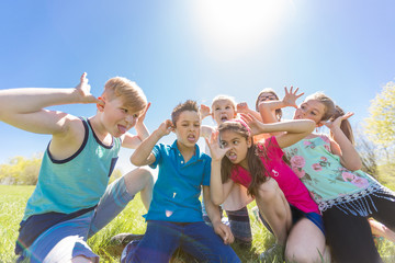 Group of child have fun on a field