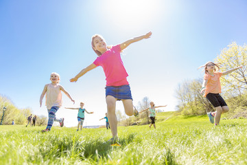 Group of child have fun on a field