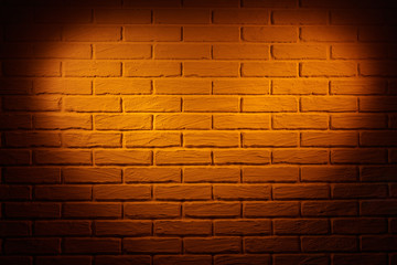 Fototapeta na wymiar brown brick wall with heart shape light effect and shadow, abstract background photo