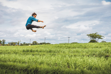 Freerunning in rice fields in Canggu, Bali