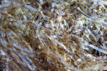 Pile of cut plastic stripes