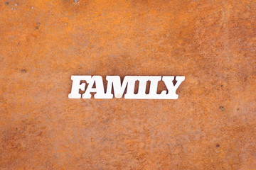 Family sign on rusty metal texture. Family problems concept