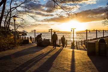 Stunning sunset in South Cove Park along the waterfront New York City